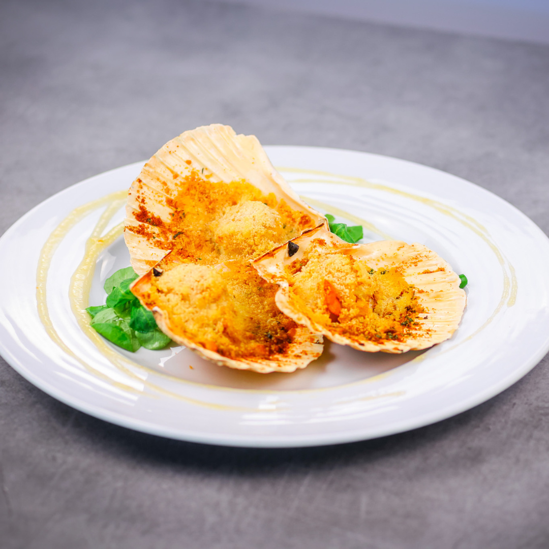Piatto di capesante gratinate - Da Dino il migliore ristorante di pesce a Torino